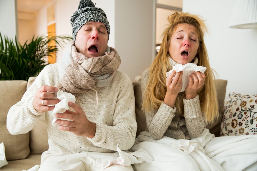 Cold, woman and man sneeze